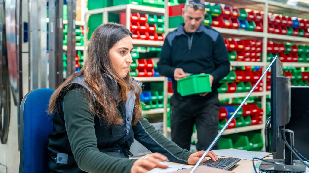 Retail-Workers-Using-Computer-to-Check-Inventory-Stock-Levels