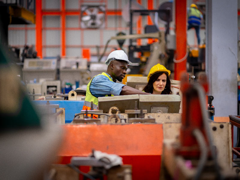 Two manufacturing workers on the shop floor