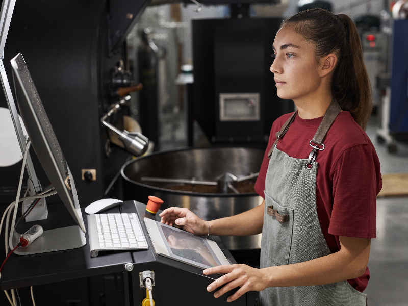 Retail worker at a computer