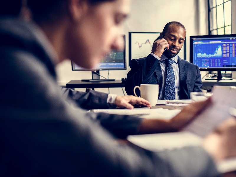 Financial workers at a desk