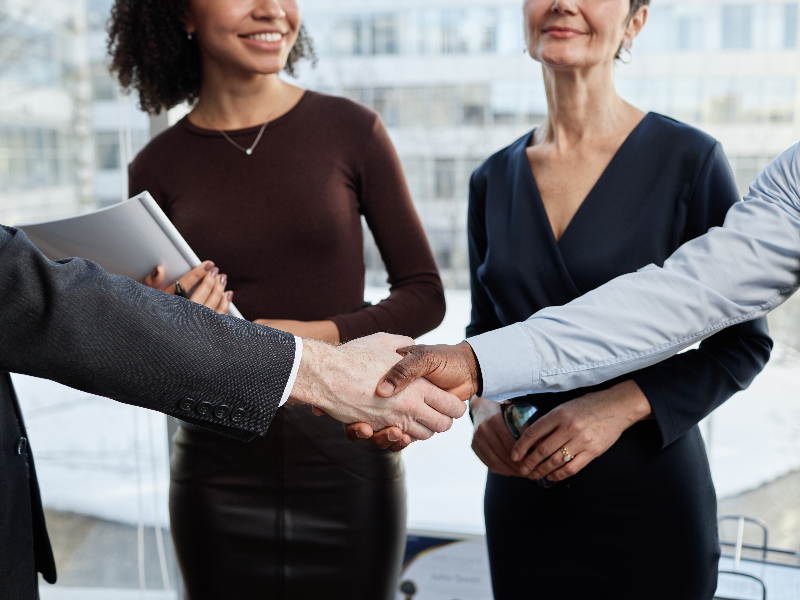 Business partners shaking hands