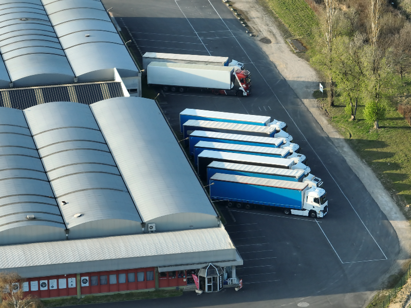 Transportation vans at a logistics hub