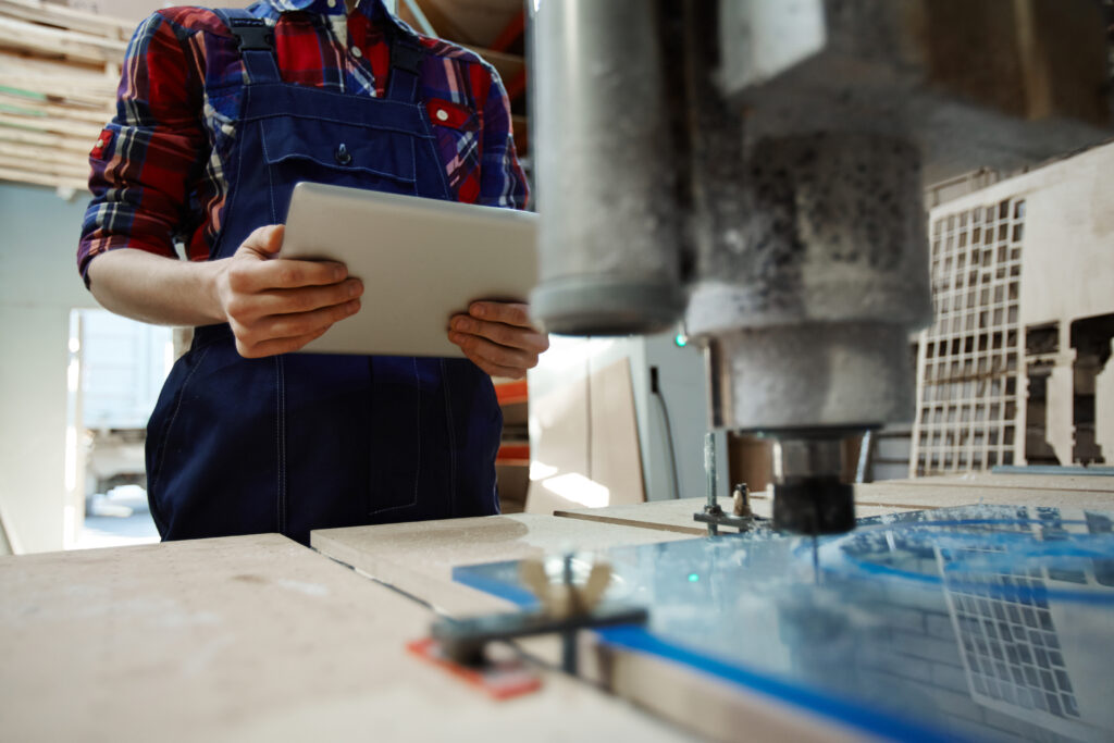 Toolmaker working from a tablet